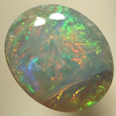 SOLID SEMI BLACK OPAL Central orange colour patch surrounded by green, all bright